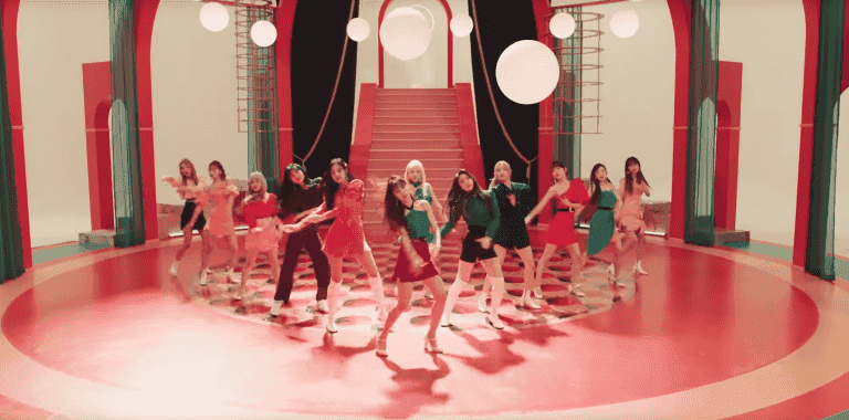 WATCH: IZ*ONE has finally blossomed with “FIESTA” music video